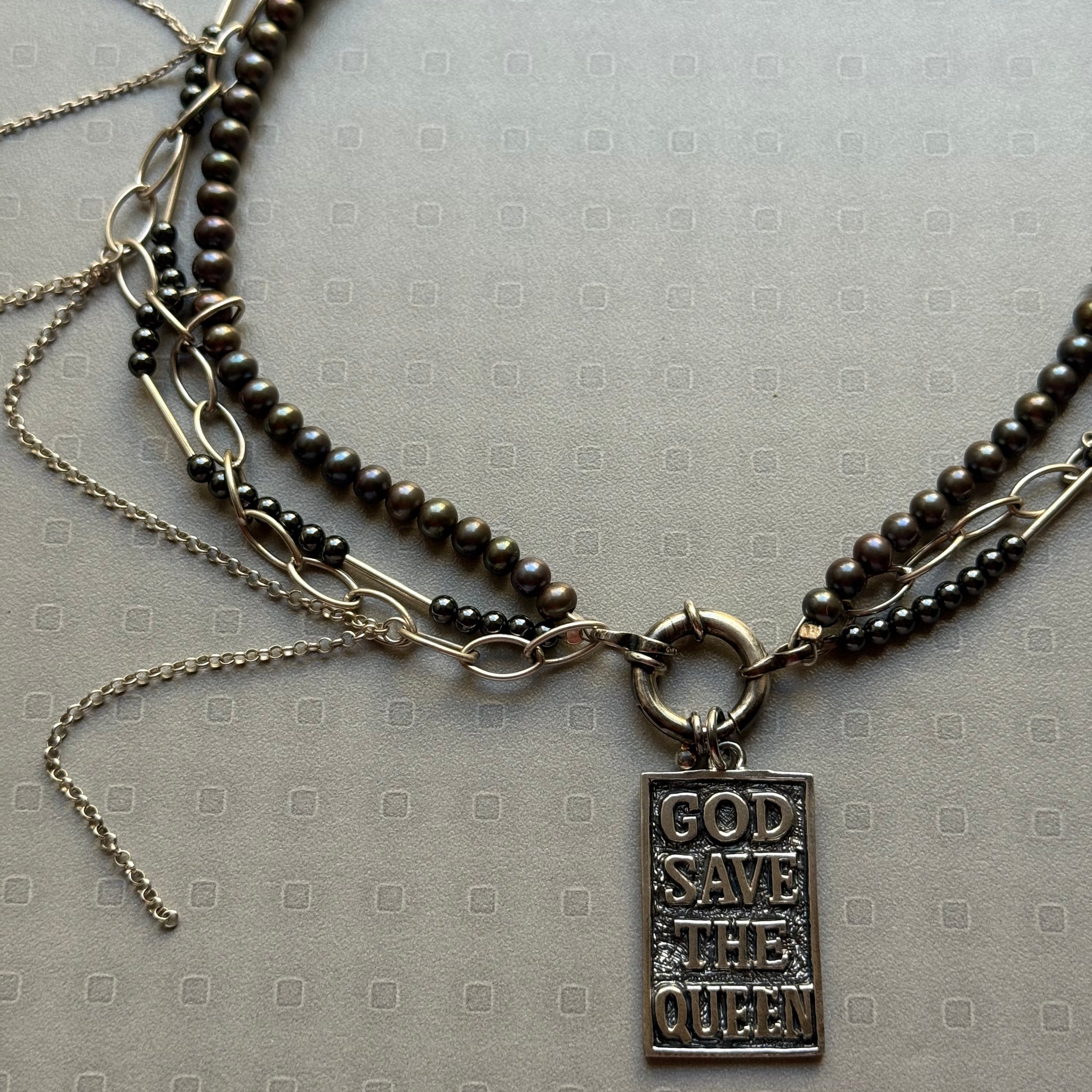"God Save the Queen" pendant