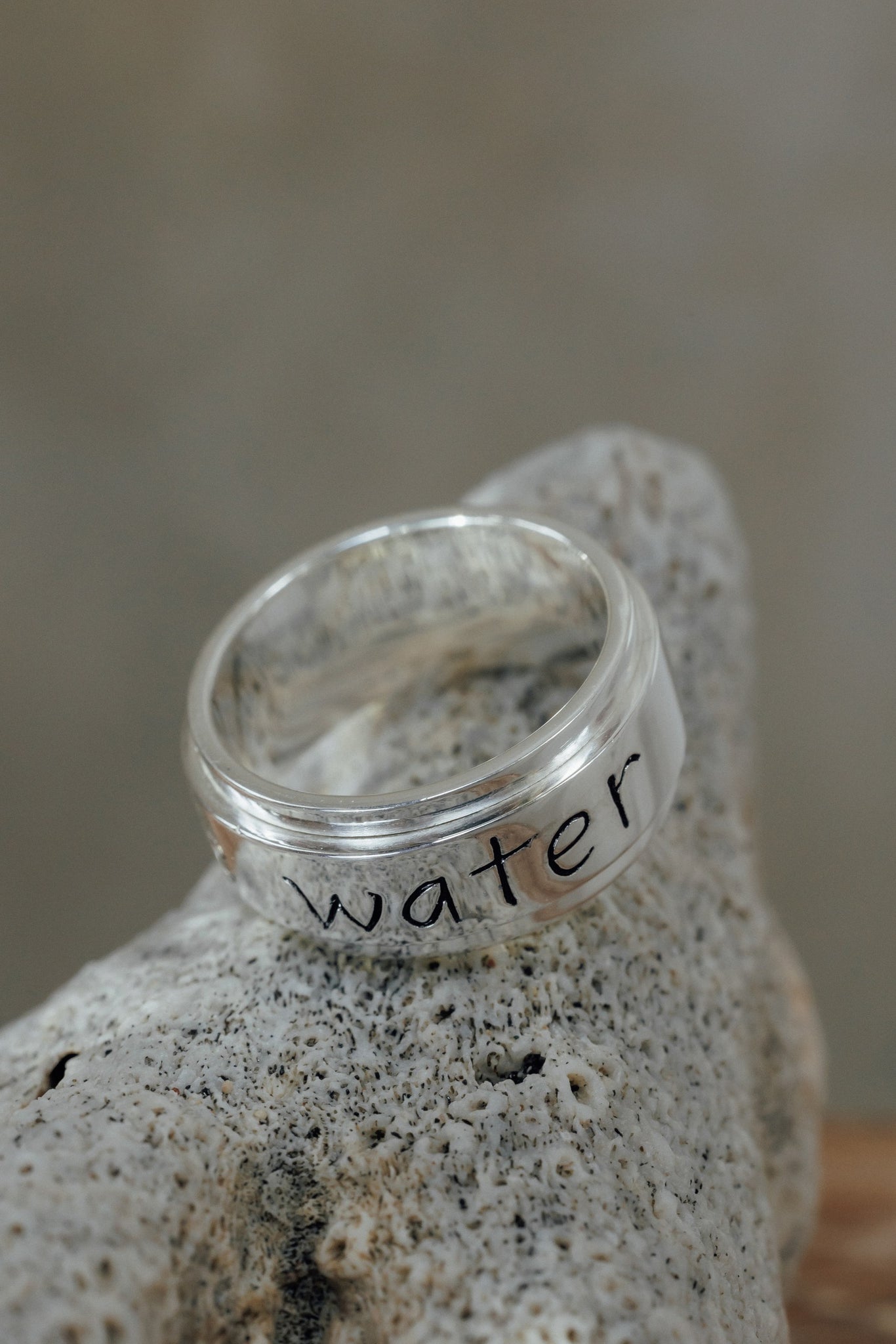 "Be like water" spinner ring